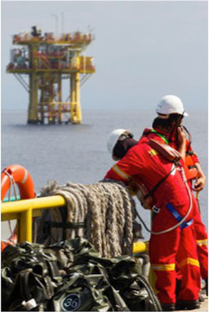 Workers on an offshore oil rig